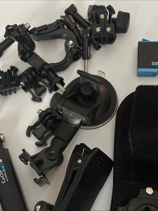 Is this handler a floating hand grip for GoPro Hero12? GoPro Accessory lot floating handler 2 battery charger suction clip mount case